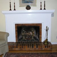 Wood burning fireplace converted to gas logs.