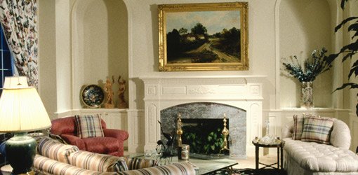 Decorated living room with fireplace mantel