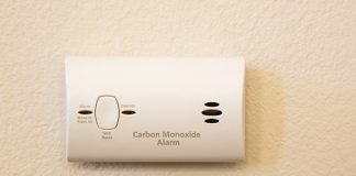 Carbon monoxide detector installed on a residential wall