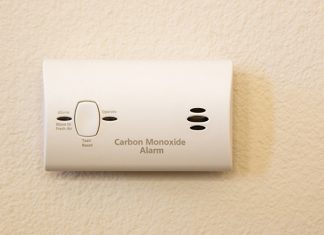 Carbon monoxide detector installed on a residential wall