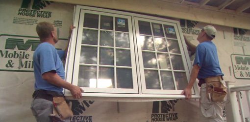 Installing casement window units on master bedroom addition.