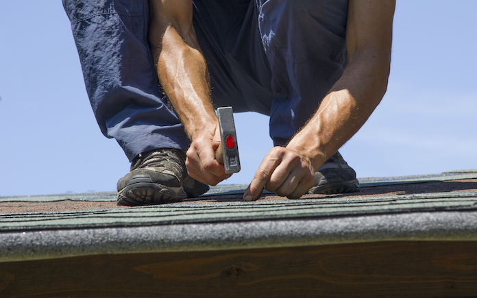 fixing a roof shingle