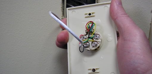 Can an electrician move a phone socket?