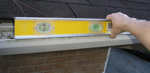 Using level to check slope on gutter