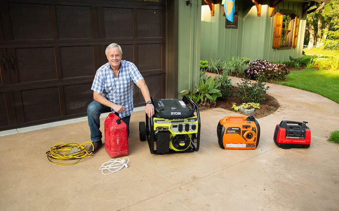 Today's Homeowner TV Host Danny Lipford poses with three portable power generators