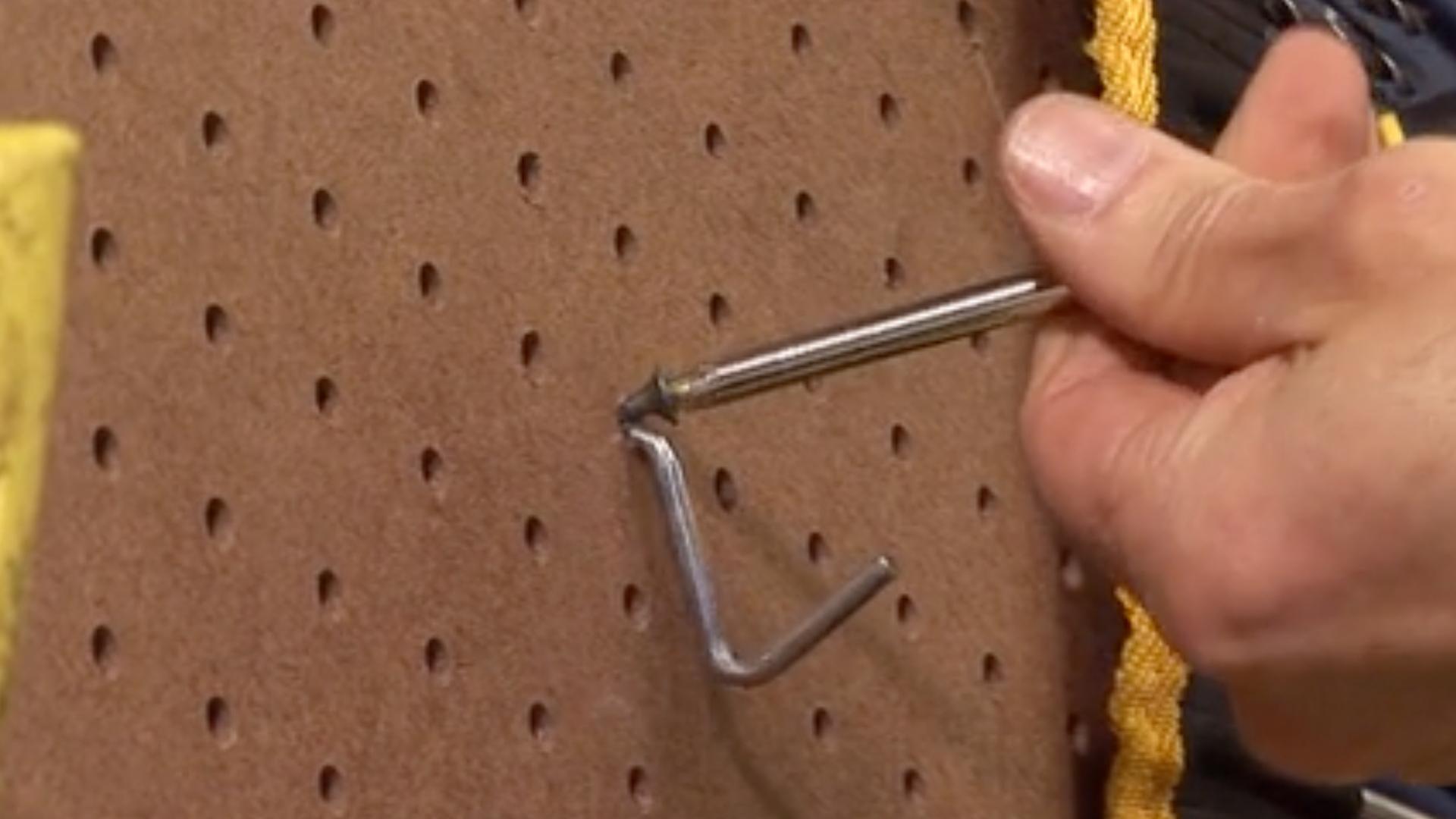 How to Secure Hooks in Pegboard - Today's Homeowner