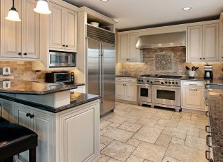 Upscale kitchen with gorgeous flooring and beautiful raised-panel cabinets
