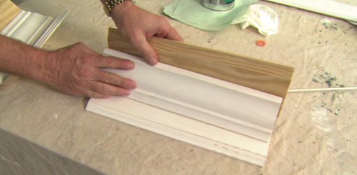 Combine two pieces of baseboard and crown molding to create custom molding.