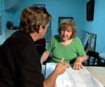 allen and a woman studying building codes