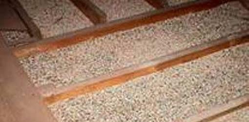 Vermiculite insulation in an attic
