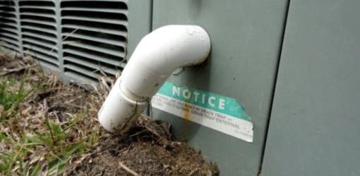 Condensation drain on air conditioner unit