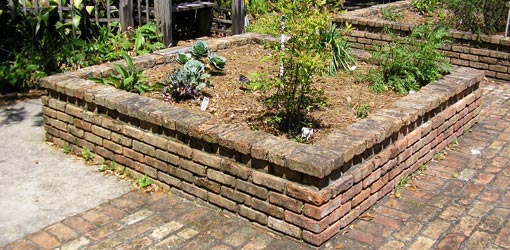 Raised planting bed made from brick