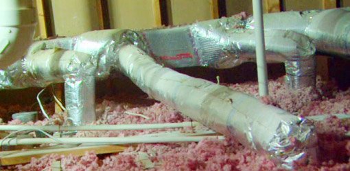 Heating and cooling HVAC ductwork in attic