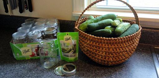 Jars, cucumbers, and ingredients for making pickles