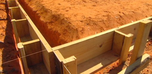 Construct wood form for concrete slab