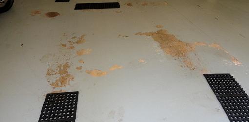 Epoxy coating peeling on garage floor