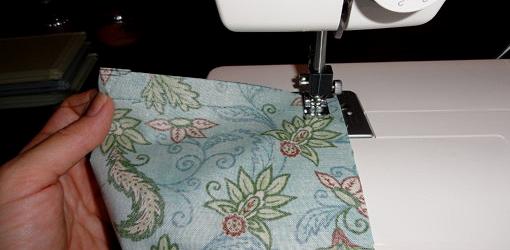 Sewing fabric on sewing machine