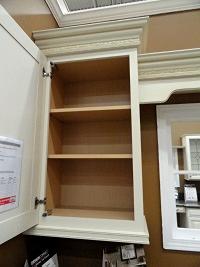Face frame cabinet with overlay door.
