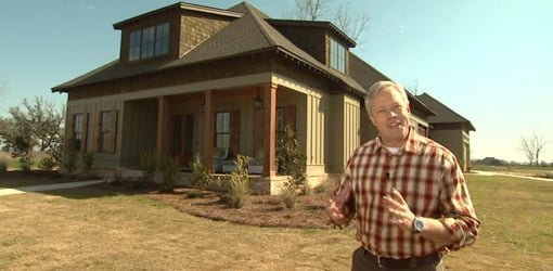 Danny Lipford standing in front of eco-friendly green home.