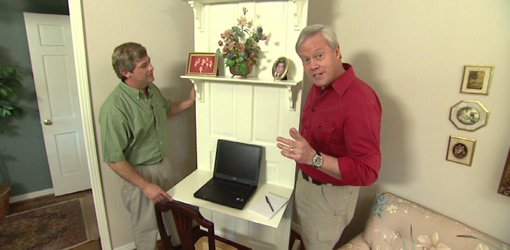 Allen Lyle and Danny Lipford with door reused as desk.
