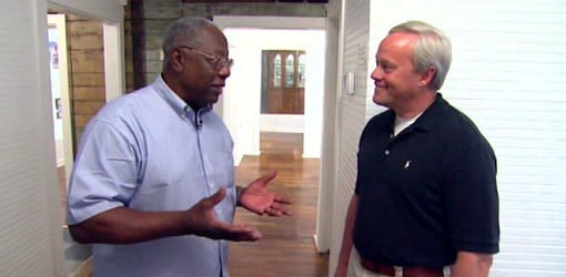 Henry Aaron talking with Danny Lipford in his renovated childhood home.