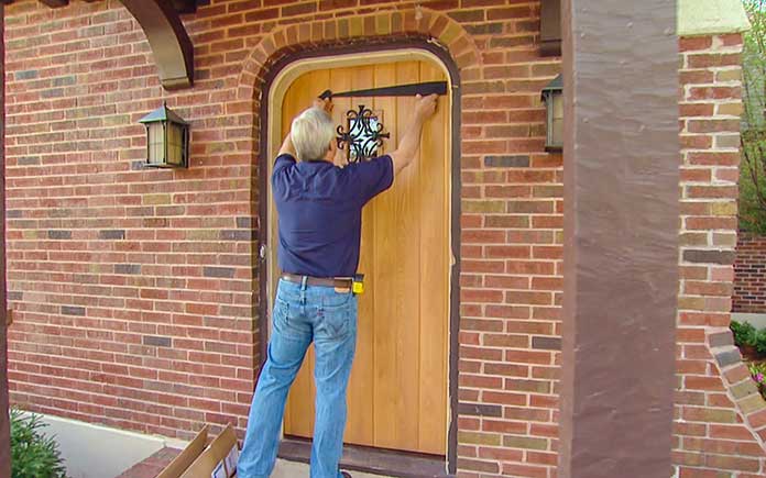 “Today’s Homeowner” host Danny Lipford installs a beautiful front door