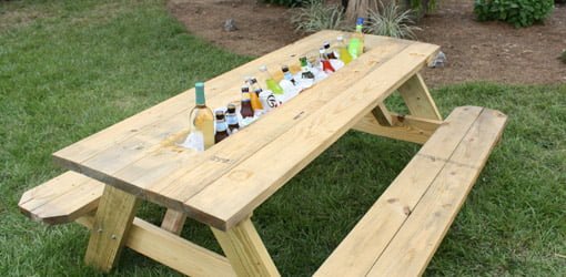 Completed picnic table drink trough full of drinks.