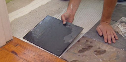 Installing tile on cement backer board over vinyl flooring.
