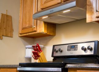 Range hood with lights on in an Alabama kitchen
