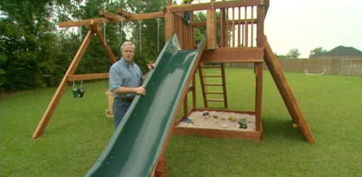 Danny Lipford with outdoor wooden playset.