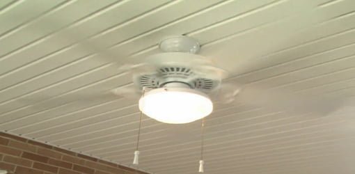 Paddle ceiling fan mounted on porch.