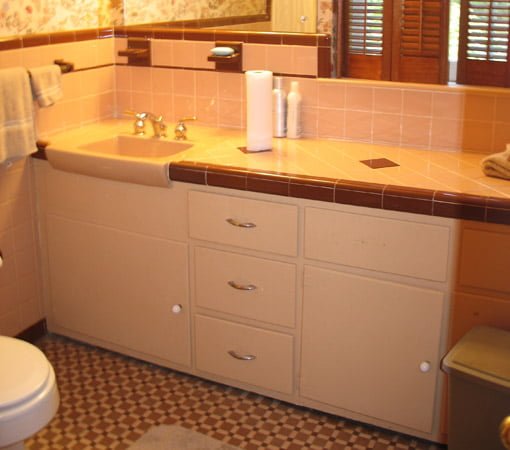 Tile vanity top with plywood cabinet.