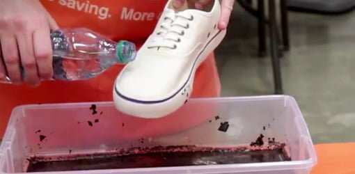 Water runs off a shoe treated with Rust-Oleum NeverWet liquid repellant spray.