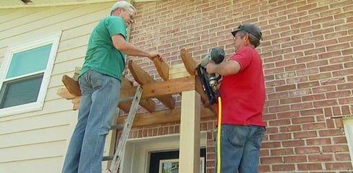 Attaching a shade arbor to a brick wall.
