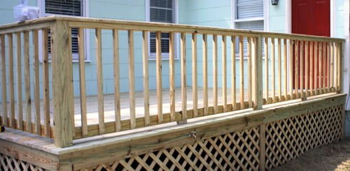 Completed wood deck railing.