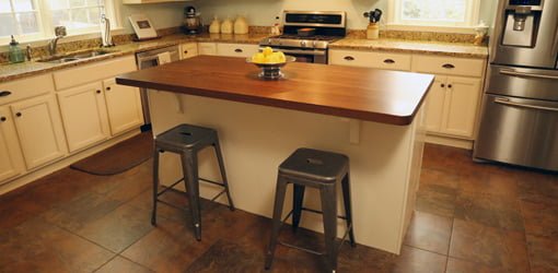Kitchen with new island and solid walnut countertop.