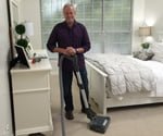 Danny Lipford in bedroom with central vacuum system.