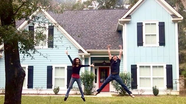 Carissa Scarpa and her fiance, Matthew, in front of their new home. 