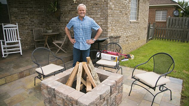Danny Lipford in front of fire pit.