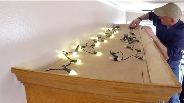 LED string lights, seen above kitchen cabinets