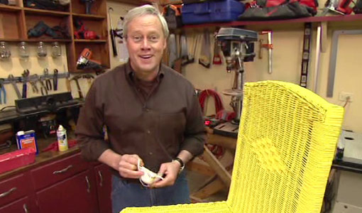 Danny Lipford with yellow spray painted wicker chair.