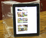 iPad in resealable plastic bag for workshop