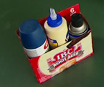 Spray cans and glue bottles in drink carton.