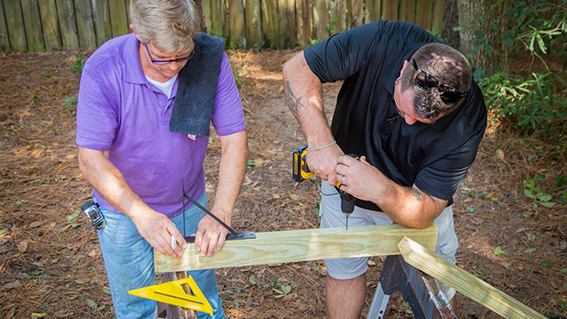 Allen and Chuck work on the new gate.