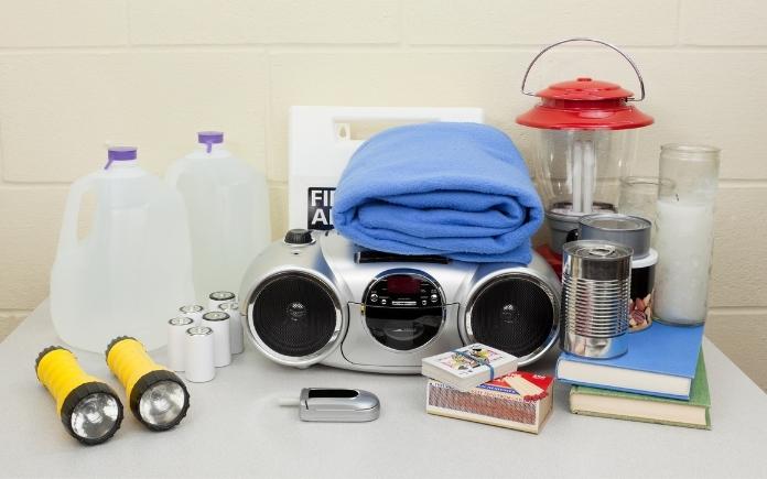 Gallons of water, flashlights, battery, radio, hurricane supplies