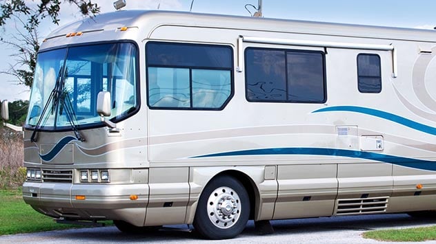 Beautiful, luxury motor home parked in a national park campground.