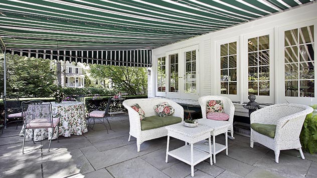 Retractable awning over a patio