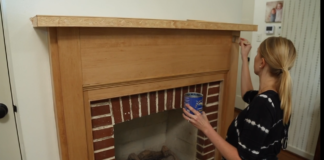 Chelsea Lipford Wolf paints her fireplace