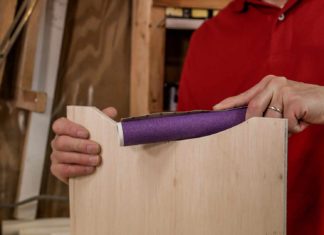 DIY hand sander made of PVC pipe and sandpaper