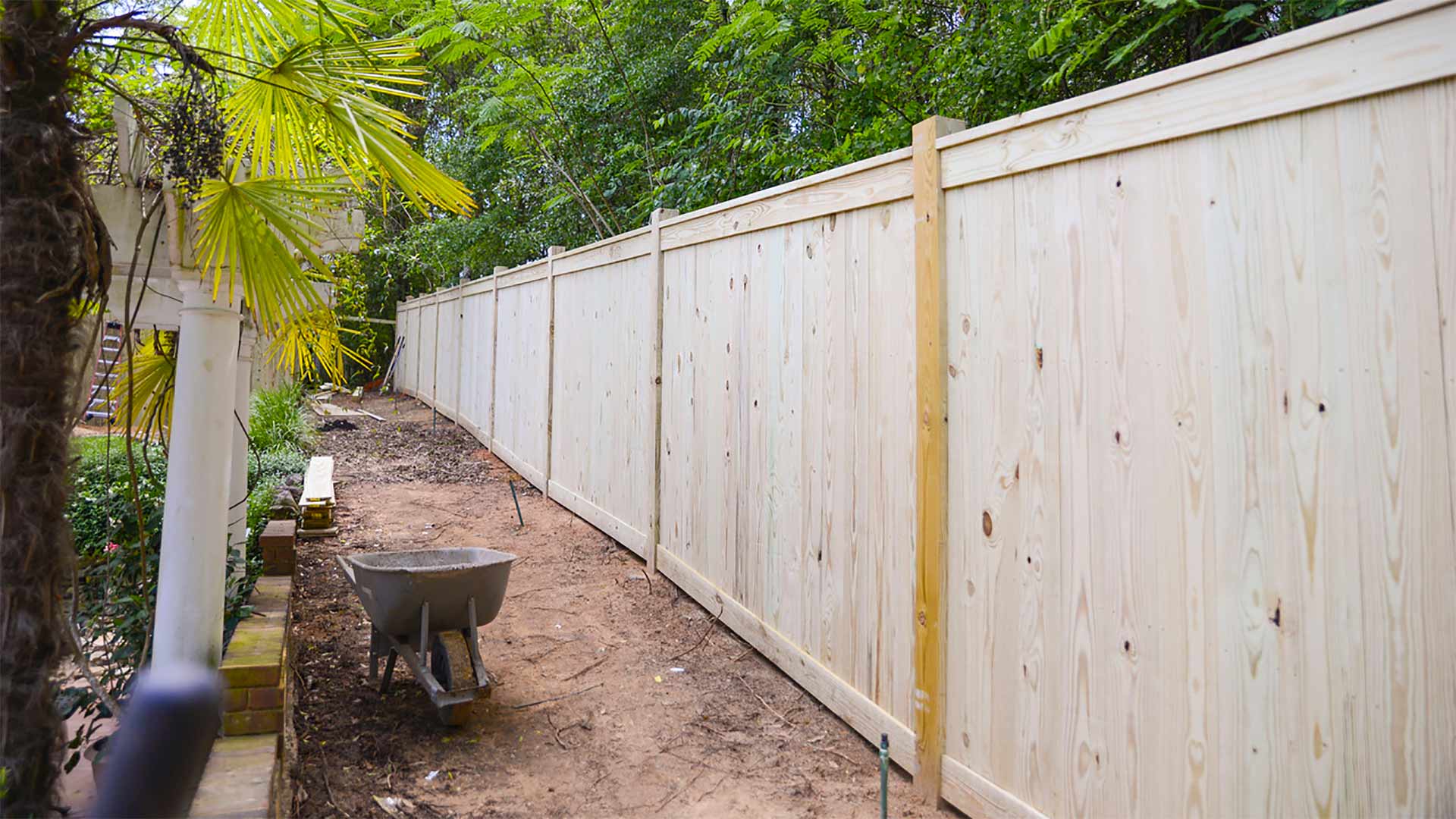 Wooden fence under construction